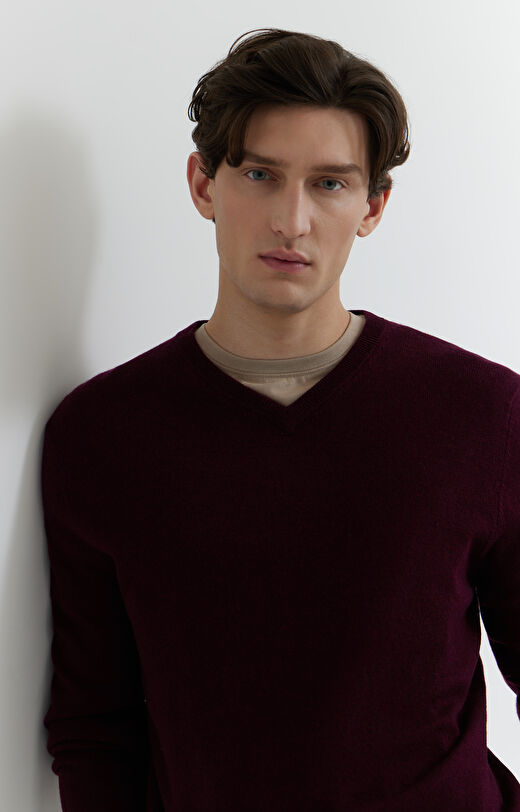 Sweter v-neck z melanżowej wełny merino