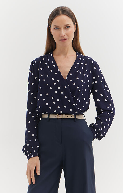 Kopertowa bluzka w kropki
